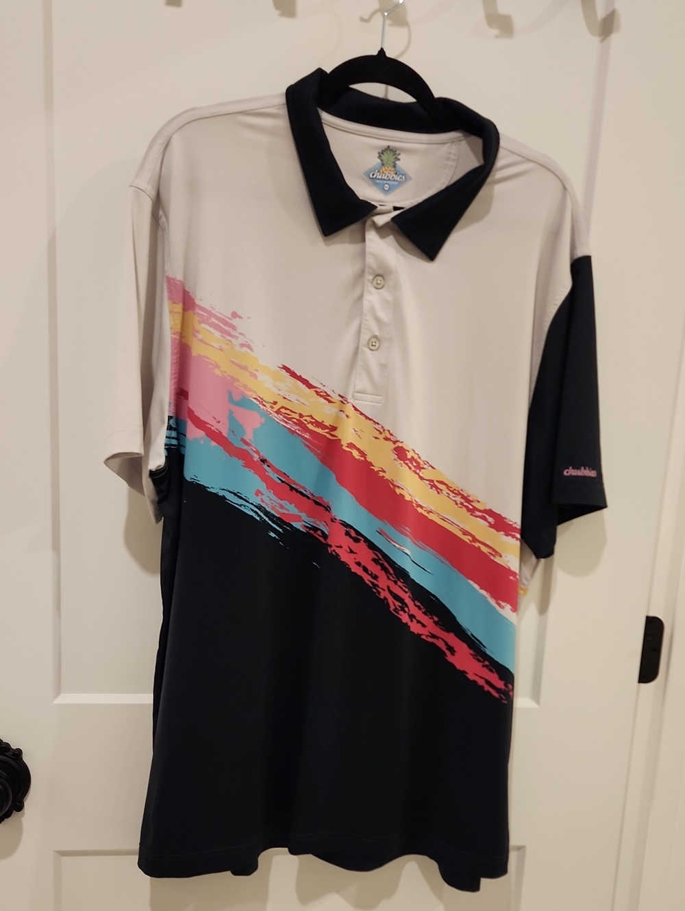 chubbies Color‑Block Polo in Black, Cream with Pink, Yellow, Teal, Red Stripes
